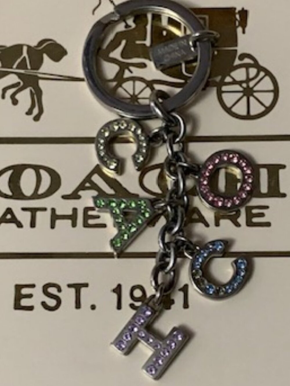 Coach Vintage key ring with multi color rhinestones